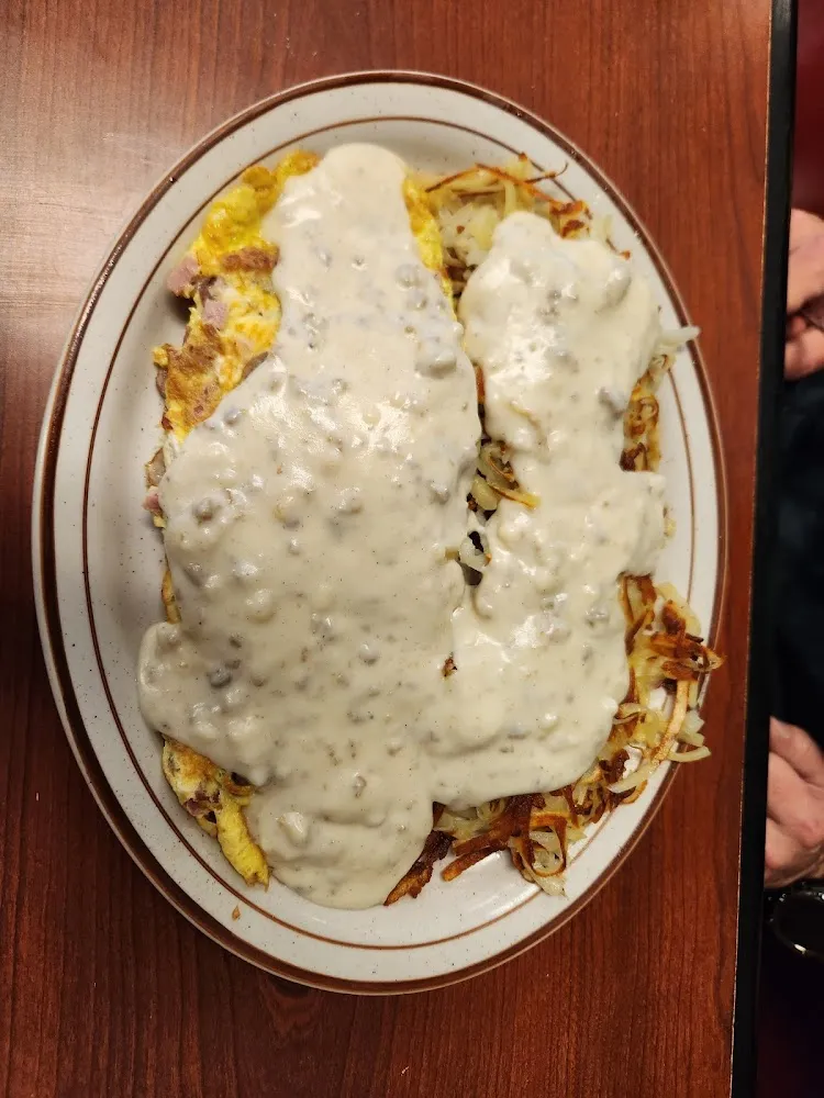 Farmers Omelet with Hash Browns Covered with Sausage Gravy